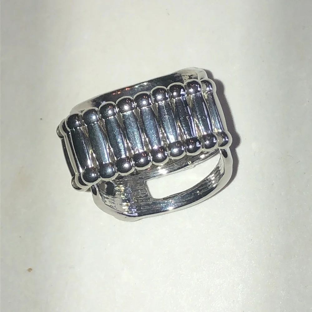 Silver Tone Ring with Green Center Stone and Clear Accents